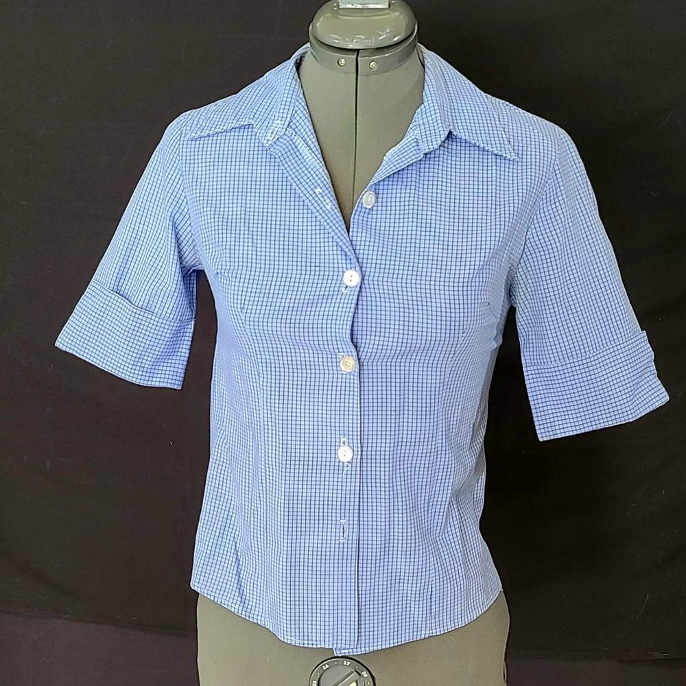 Light Blue Button Up Shirt With 3/4 sleeves and dark blue checker boxes